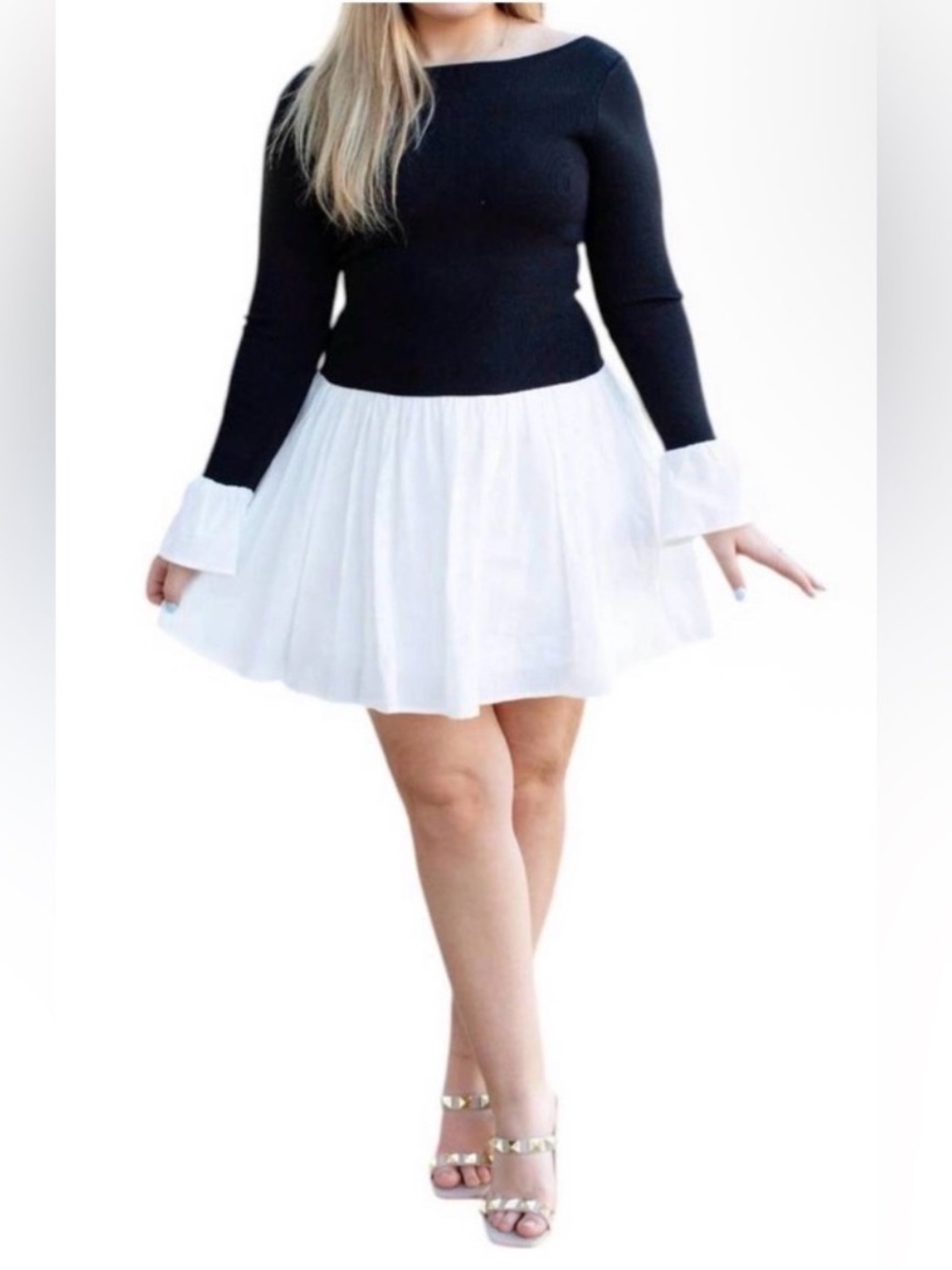 Able Black Knit Top with White Trim Accent

Stretchy will fit Med-XL